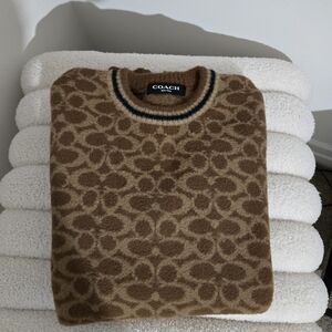 Coach Men's Tan Patterned Crewneck Sweater medium size.